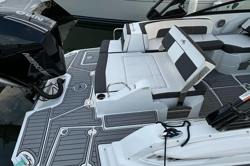 Slide: The Image of 2022 Monterey M-45 boat with sleek seating and Mercury outboard engine. - 27