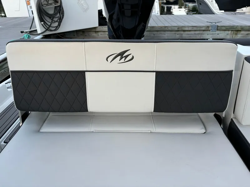 Slide: The Image of Monterey M-45 2022 boat seat with black and white upholstery design. - 29