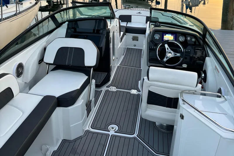 Slide: The Image of 2022 Monterey M-45 boat interior with sleek seating and modern dashboard. - 3