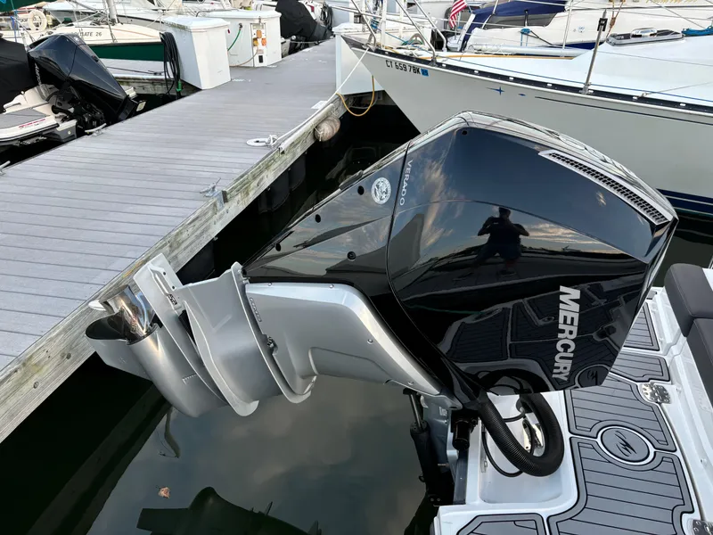 Slide: The Image of Monterey M-45 boat with Mercury outboard engine docked at marina, 2022 model. - 30