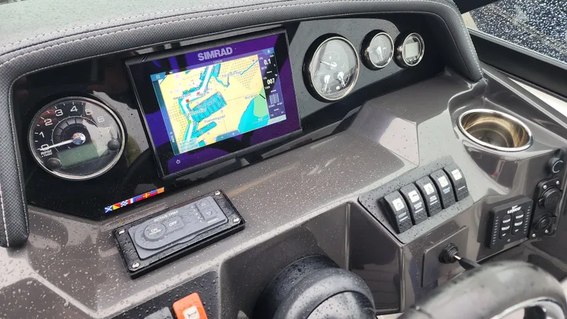 Slide: The Image of Dashboard of 2022 Monterey M-45 boat with navigation system and controls. - 42