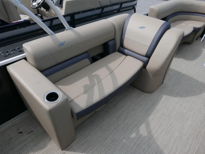 Slide: The Image of 2025 Starcraft EX Fish 20 FD boat seating with beige and gray upholstery. - 13
