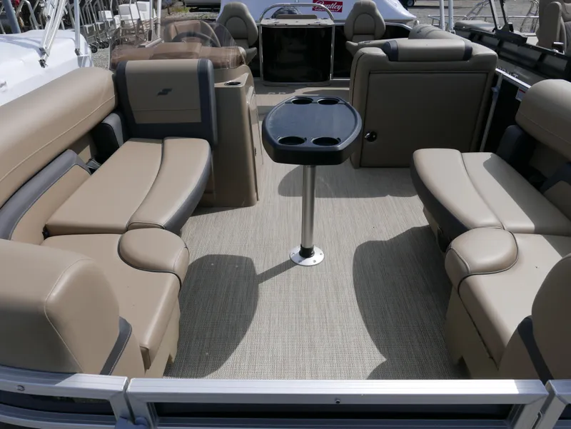 Slide: The Image of Spacious interior of 2025 Starcraft EX Fish 20 FD boat with comfortable seating and table. - 9