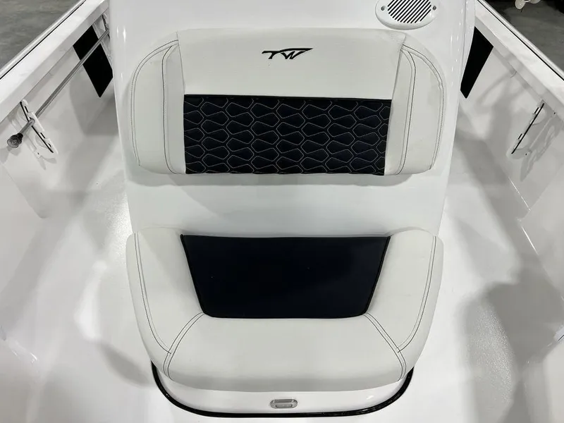 Slide: The Image of 2025 Tidewater 2110 Bay Max boat seat with black and white upholstery design. - 13