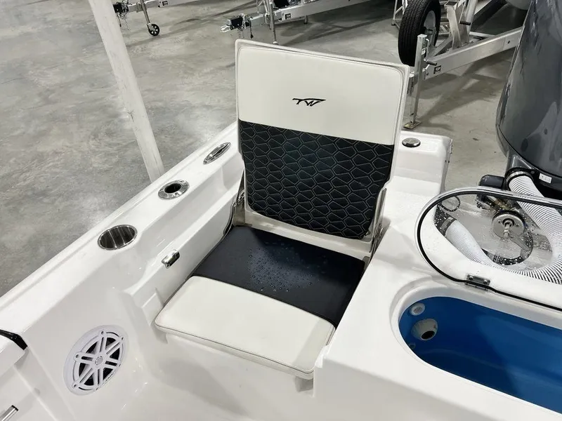 Slide: The Image of 2025 Tidewater 2110 Bay Max boat seat with cup holders and storage. - 22