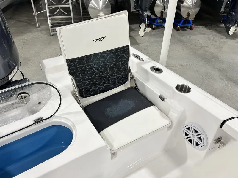 Slide: The Image of 2025 Tidewater 2110 Bay Max boat seat with storage and cup holders. - 24