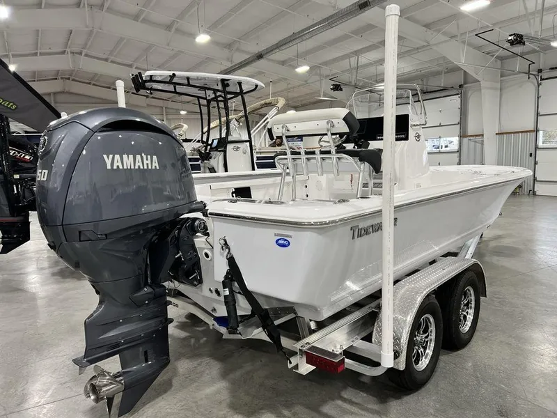 Slide: The Image of 2025 Tidewater 2110 Bay Max boat with Yamaha engine on trailer in showroom. - 3