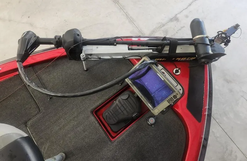 Slide: The Image of 2013 Skeeter TZX 190 boat deck with trolling motor and fish finder. - 10