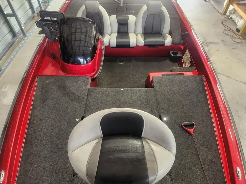 Slide: The Image of 2013 Skeeter TZX 190 boat interior with seating and fishing deck. - 8