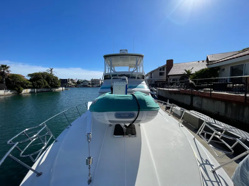 Slide: The Image of 1988 Trojan 12 Meter Convertible yacht interior with marina view. - 29