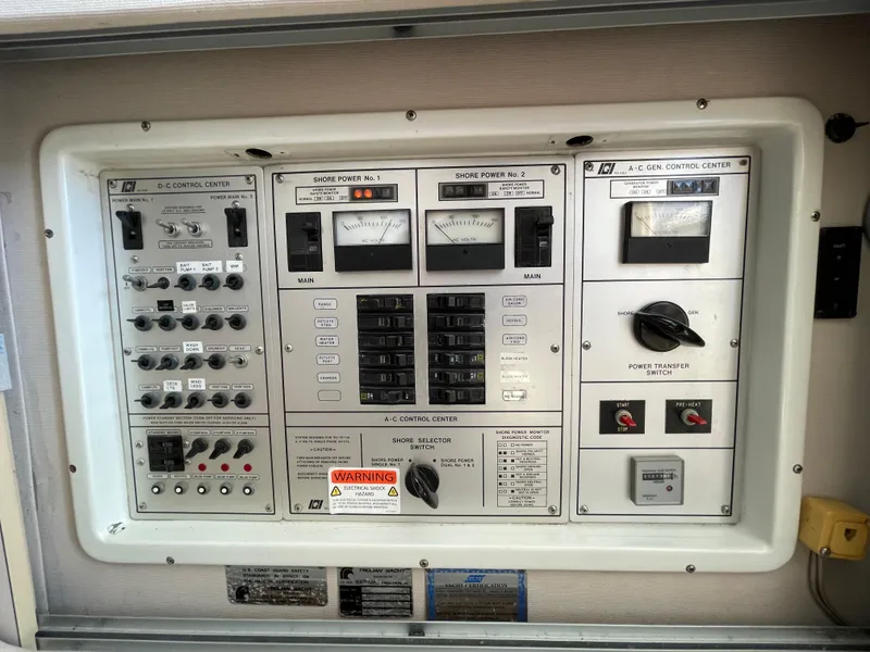 Slide: The Image of Interior of 1988 Trojan 12 Meter Convertible yacht with cozy seating and waterfront view. - 41