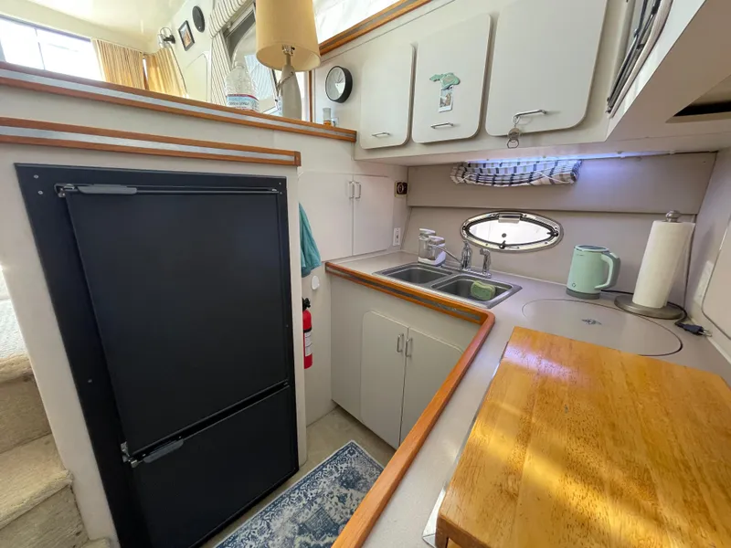 Slide: The Image of Navigation screen inside 1988 Trojan 12 Meter Convertible boat cockpit. - 44