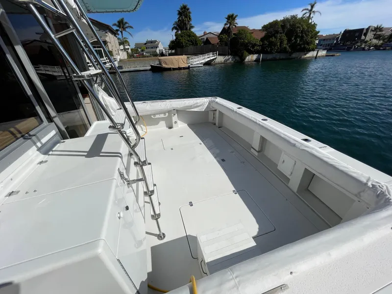 Slide: The Image of 1988 Trojan 12 Meter Convertible boat docked, "Honu Kai" Channel Islands, CA. - 6