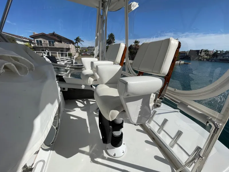 Slide: The Image of 1988 Trojan 12 Meter Convertible yacht deck with ladder and storage. - 15