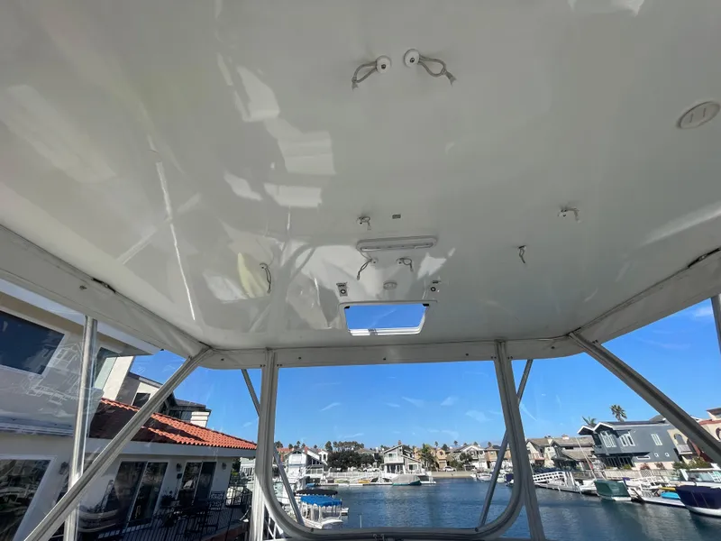 Slide: The Image of 1988 Trojan 12 Meter Convertible yacht dashboard with ocean view. - 23