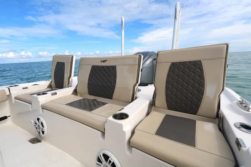 Slide: The Image of 2021 Tidewater 2500 Carolina Bay boat seats with ocean backdrop. - 9