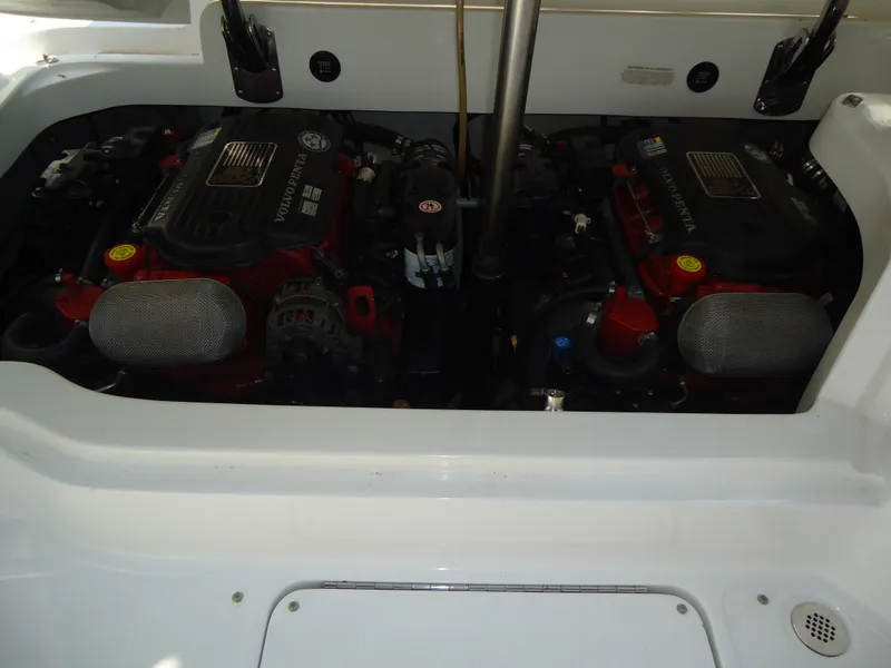 Slide: The Image of Engine compartment of a 2007 Cobalt 302 boat, featuring dual Volvo Penta engines. - 19