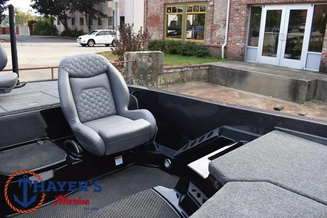 Slide: The Image of 2025 Ikon Boats VLX20 interior with gray seating at Thayer's Marine. - 15