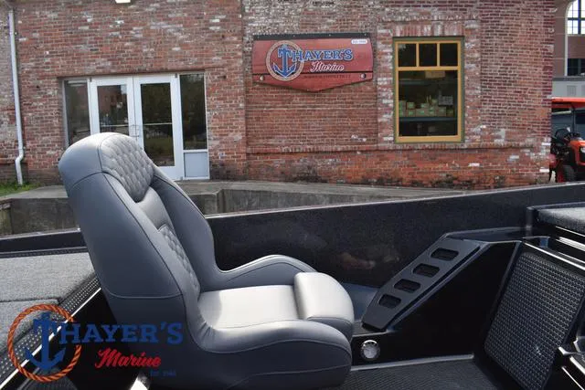 Slide: The Image of Ikon Boats VLX20 2025 model at Thayer's Marine, featuring a comfortable captain's chair. - 16
