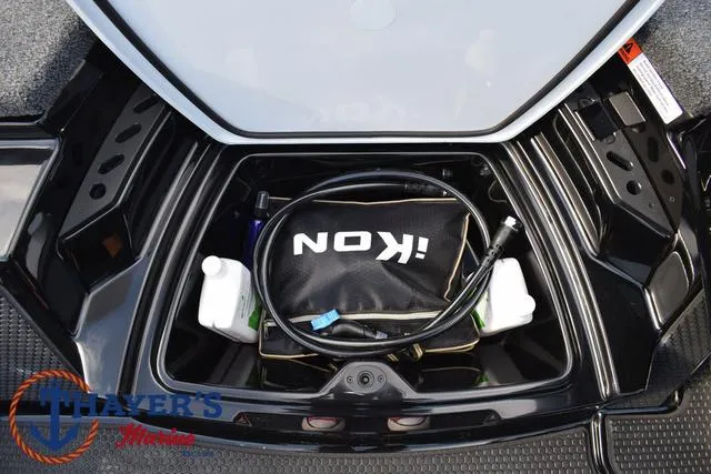 Slide: The Image of 2025 Ikon Boats VLX20 storage compartment with accessories and equipment. - 20