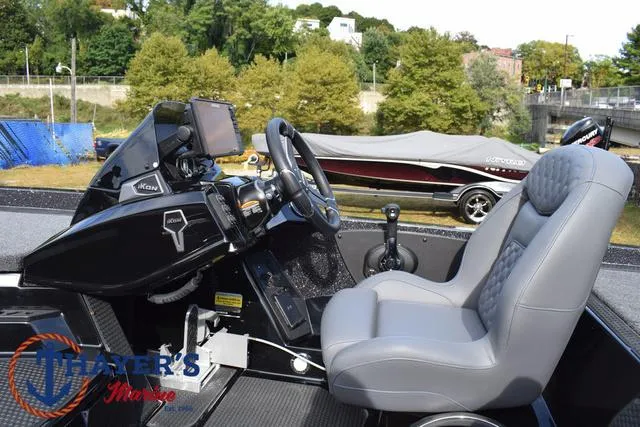 Slide: The Image of 2025 Ikon Boats VLX20 interior with modern dashboard and comfortable seating. - 23