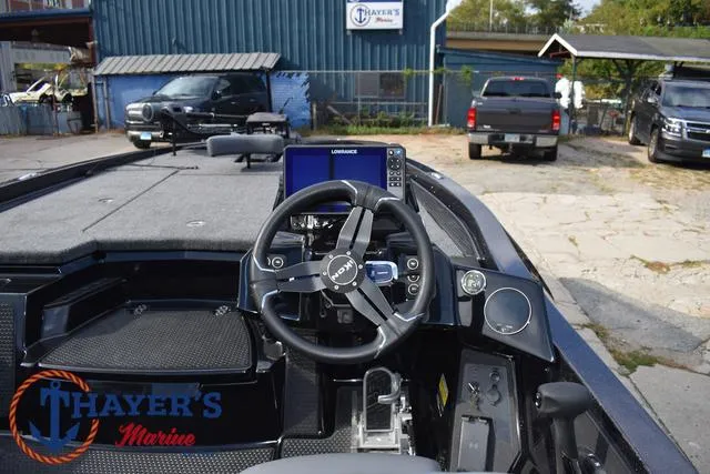 Slide: The Image of 2025 Ikon Boats VLX20 dashboard at Thayer's Marine dealership. - 24