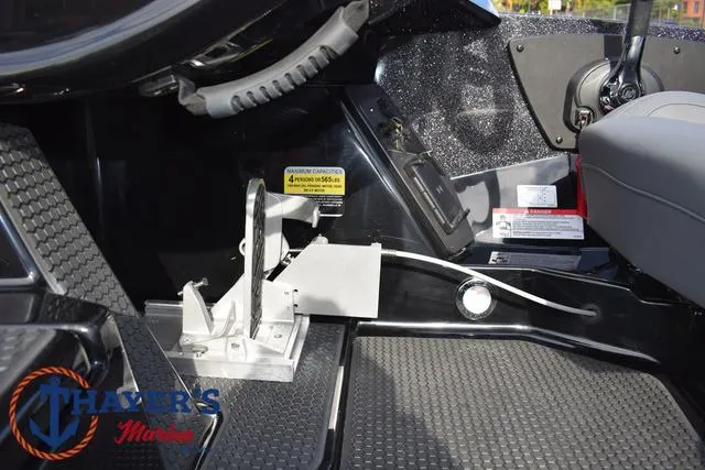 Slide: The Image of Interior of 2025 Ikon Boats VLX20, featuring steering and control panel details. - 25