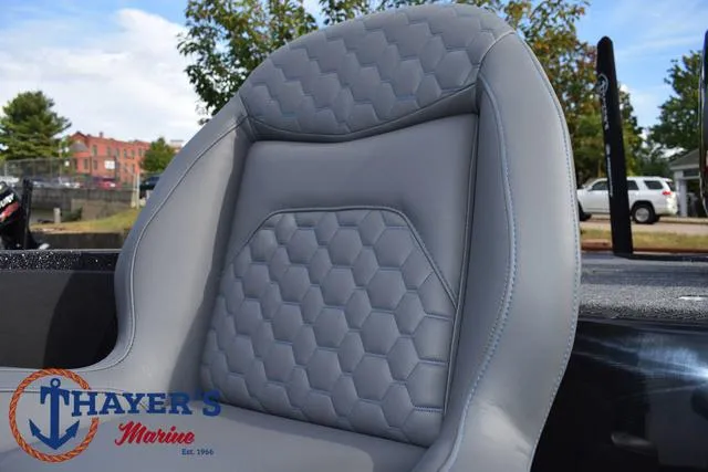 Slide: The Image of 2025 Ikon Boats VLX20 seat with hexagonal pattern, showcased by Thayer's Marine. - 27
