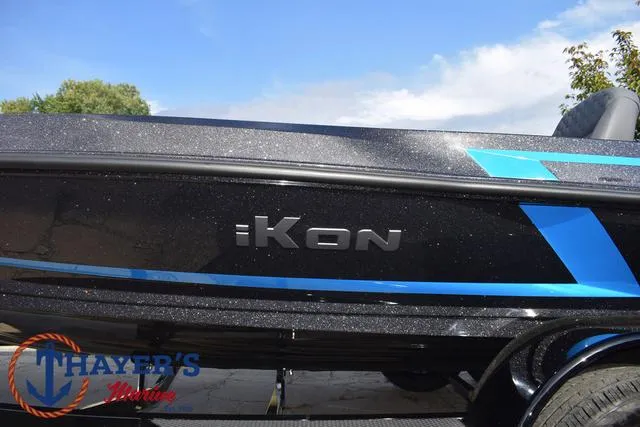 Slide: The Image of 2025 Ikon Boats VLX20 with sleek black and blue design, Thayer's Marine logo visible. - 3