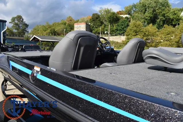 Slide: The Image of 2025 Ikon Boats VLX20 with sleek design and comfortable seating on a sunny day. - 7