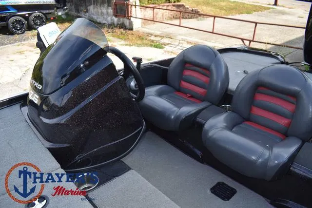 Slide: The Image of 2011 Nitro Z Series Z-6 boat interior with dual seats and steering console. - 15