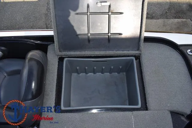 Slide: The Image of Open storage compartment in 2011 Nitro Z Series Z-6 boat. - 19