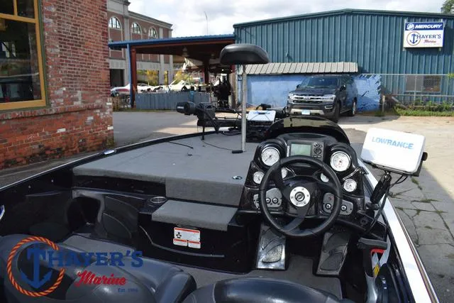 Slide: The Image of 2011 Nitro Z Series Z-6 boat interior with steering wheel and Lowrance equipment. - 23