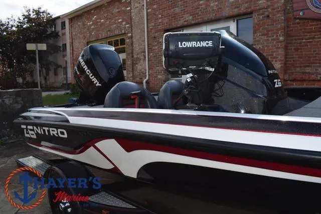 Slide: The Image of 2011 Nitro Z Series Z-6 boat with Mercury engine and Lowrance equipment, displayed at Thayer's Marine. - 26