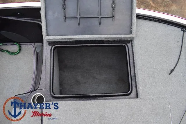 Slide: The Image of Open storage compartment on 2011 Nitro Z Series Z-6 boat deck. - 6