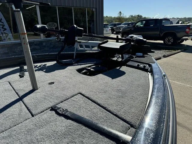 Slide: The Image of 2025 Phoenix 819 ZXL boat deck with mounted equipment in a parking lot. - 9