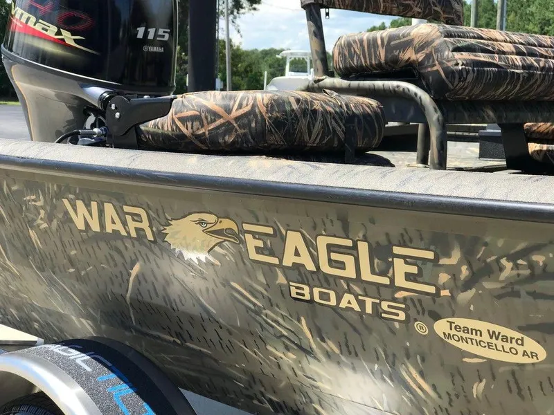 Slide: The Image of War Eagle Blackhawk 961 boat, camo design, Yamaha 115 engine, 2025 model. - 14