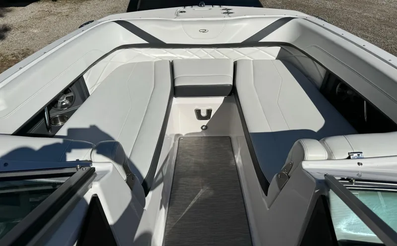 Slide: The Image of 2018 Regal 26 FasDeck boat interior with sleek seating and modern design. - 7