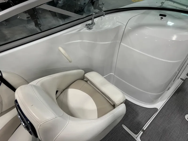 Slide: The Image of Interior of a 2008 Azure 278 boat, featuring white seating and sleek design. - 10