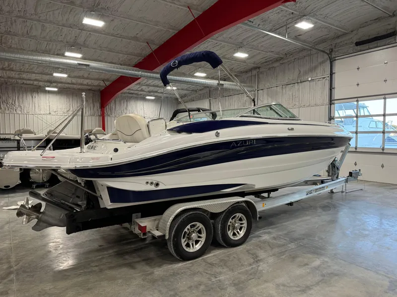Slide: The Image of 2008 Azure 278 boat on trailer in indoor storage facility. - 3