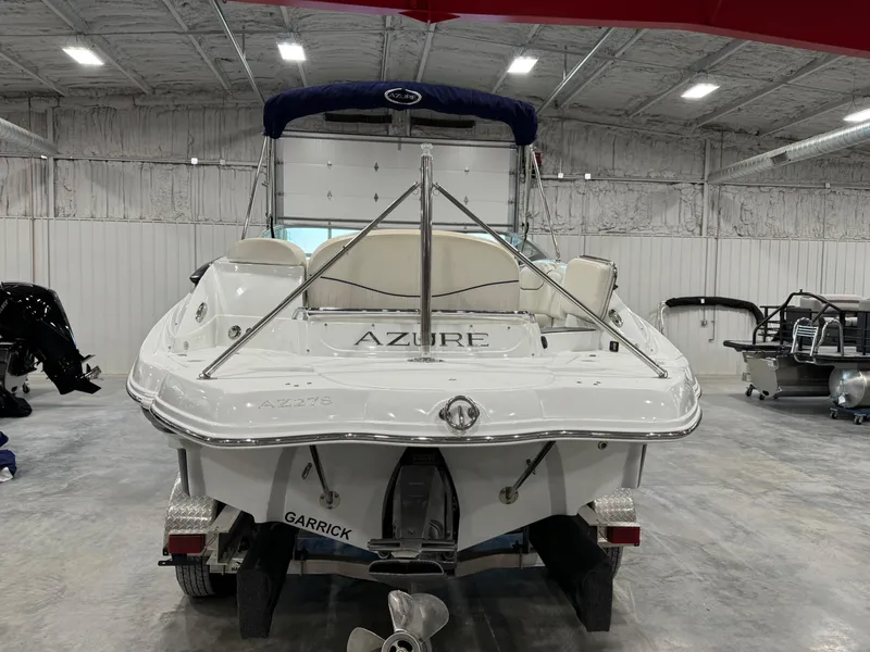 Slide: The Image of 2008 Azure 278 boat in a warehouse, rear view with trailer. - 5