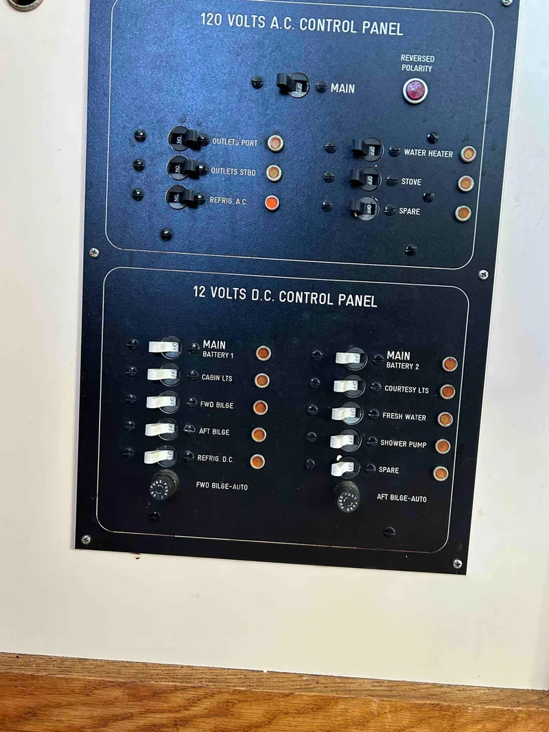Slide: The Image of Electrical control panel on a 1986 Silverton 31 Convertible boat. - 11