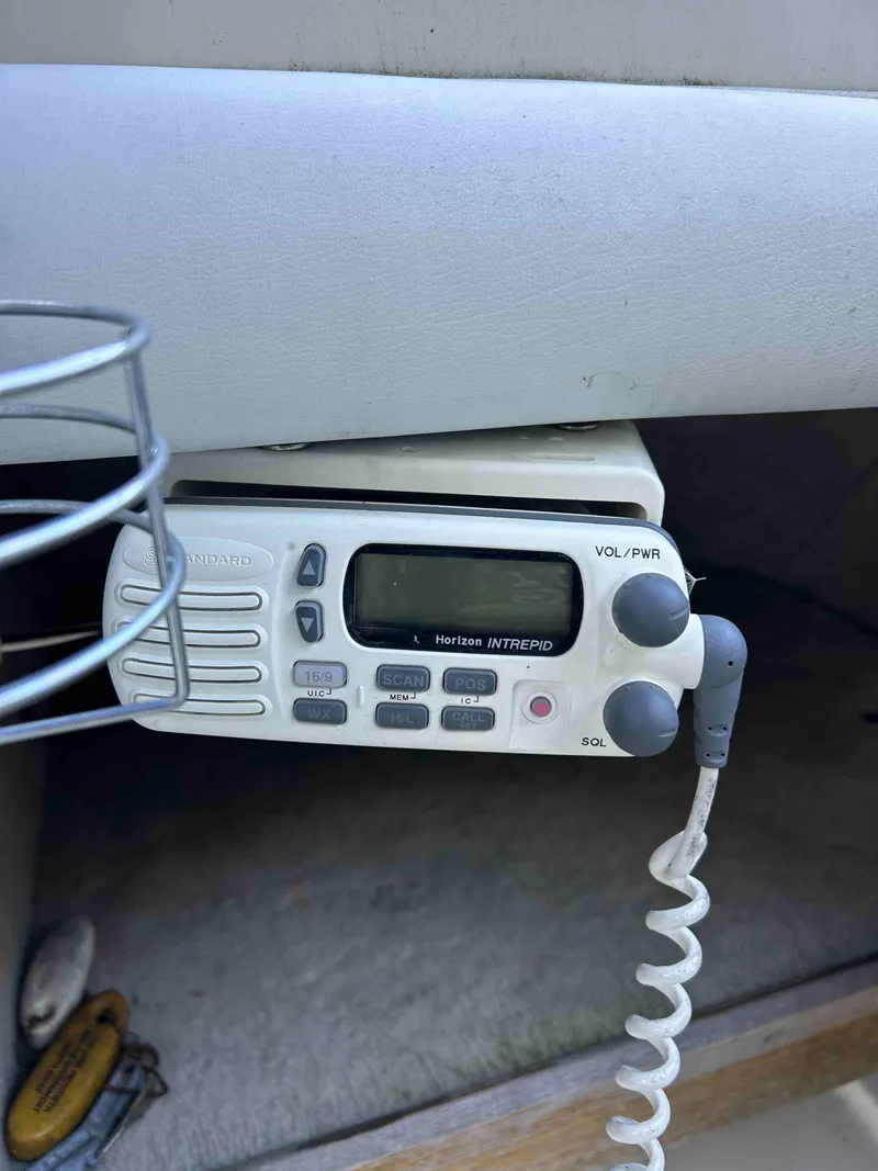 Slide: The Image of Marine radio on 1986 Silverton 31 Convertible boat dashboard. - 7