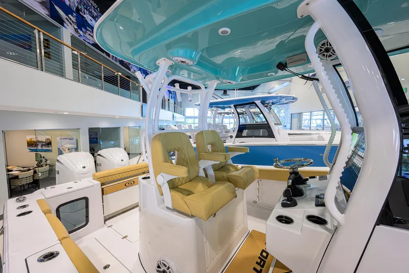 Slide: The Image of 2025 Sportsman Open 282 Center Console boat interior with dual seats and modern helm. - 13