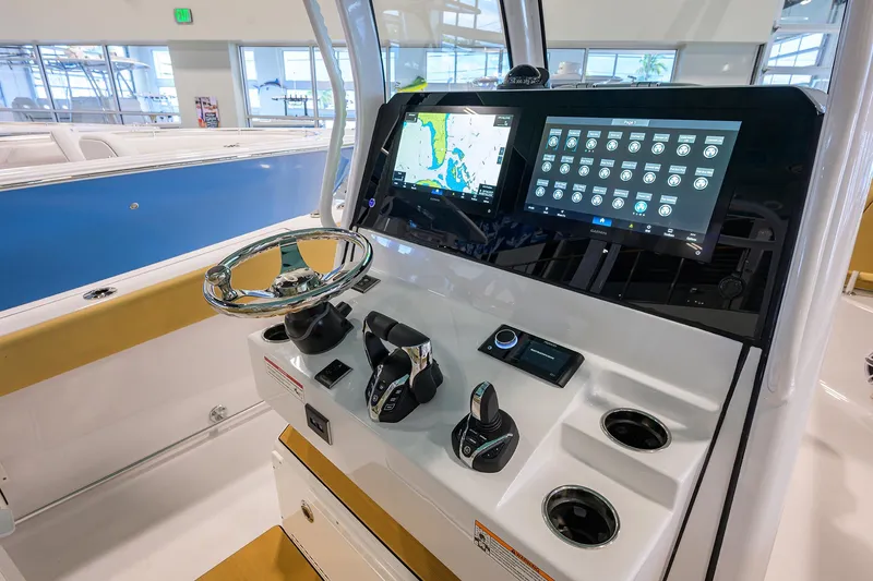 Slide: The Image of 2025 Sportsman Open 282 Center Console dashboard with advanced navigation and controls. - 17