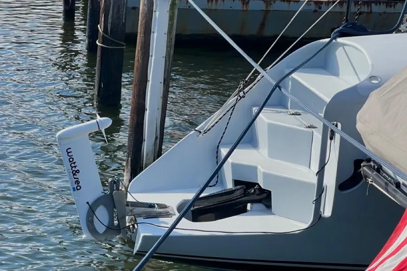 Slide: The Image of Morrelli & Melvin Shooting Star 2007 sailboat docked with visible rudder and steps. - 21