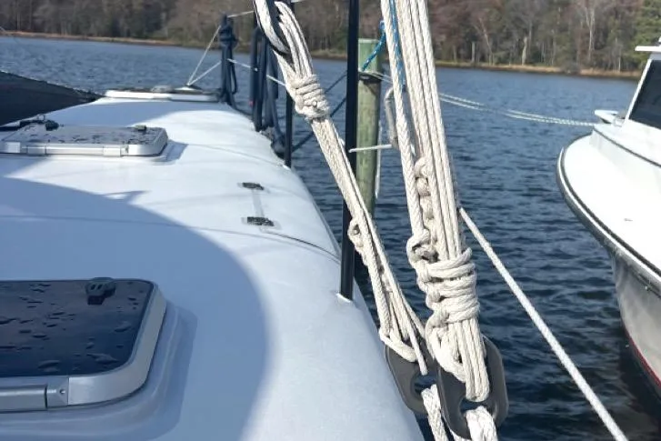 Slide: The Image of 2007 Morrelli & Melvin Shooting Star yacht docked on calm water. - 22