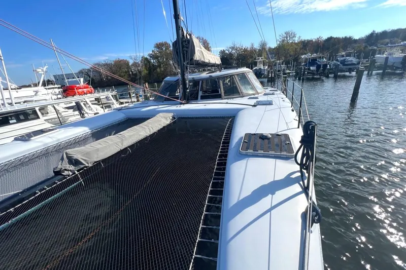 Slide: The Image of 2007 Morrelli & Melvin Shooting Star catamaran docked at marina. - 25