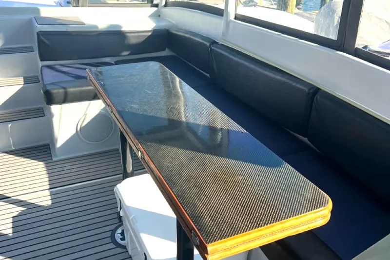 Slide: The Image of Luxurious interior of 2007 Morrelli & Melvin Shooting Star yacht with sleek seating and table. - 29