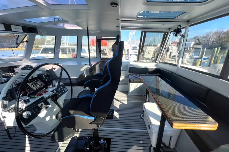 Slide: The Image of Interior of 2007 Morrelli & Melvin Shooting Star yacht with modern helm and seating area. - 30